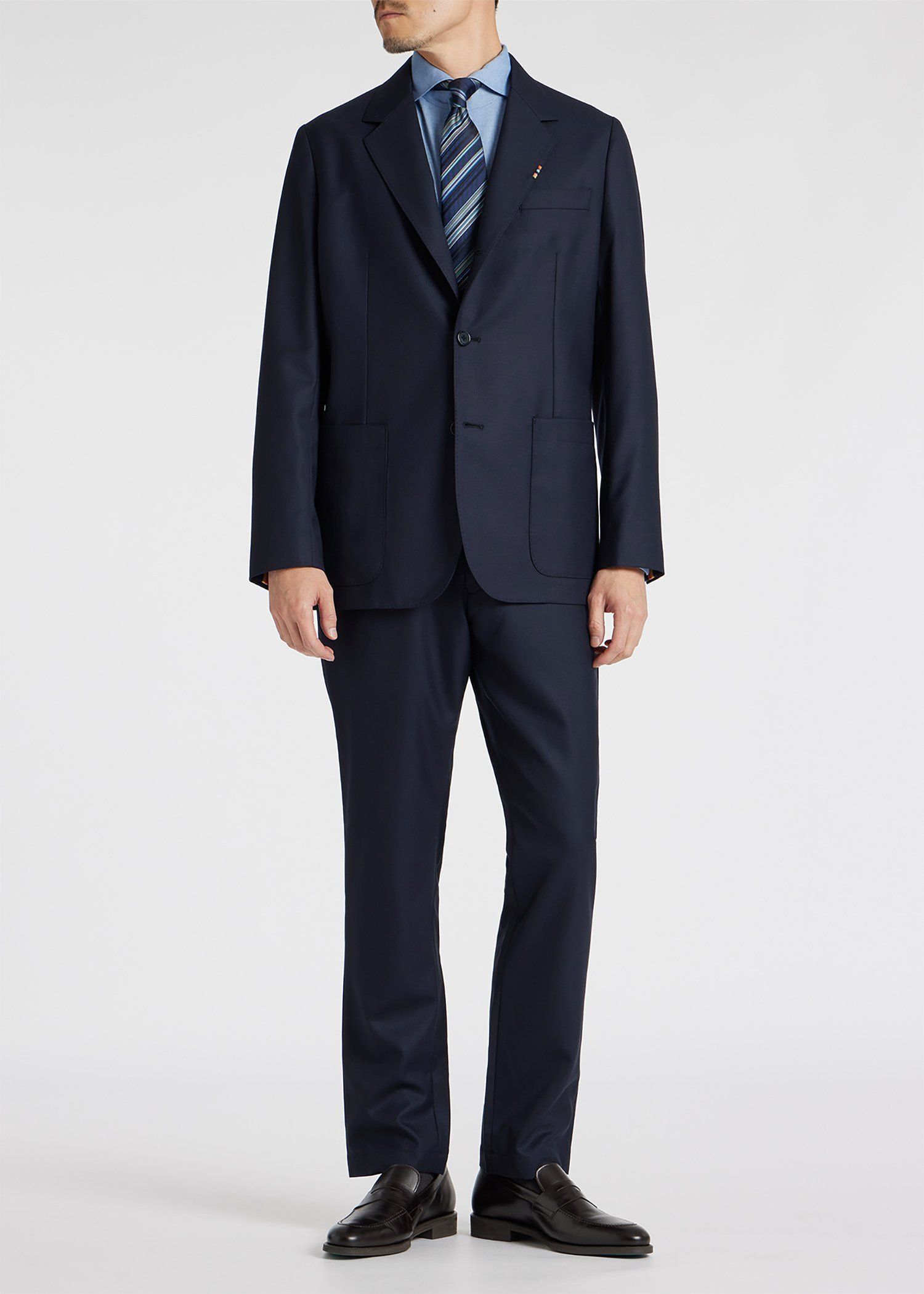 ソリッド ウールストレッチ テーパード トラウザーズ 'A Suit To Travel In'
